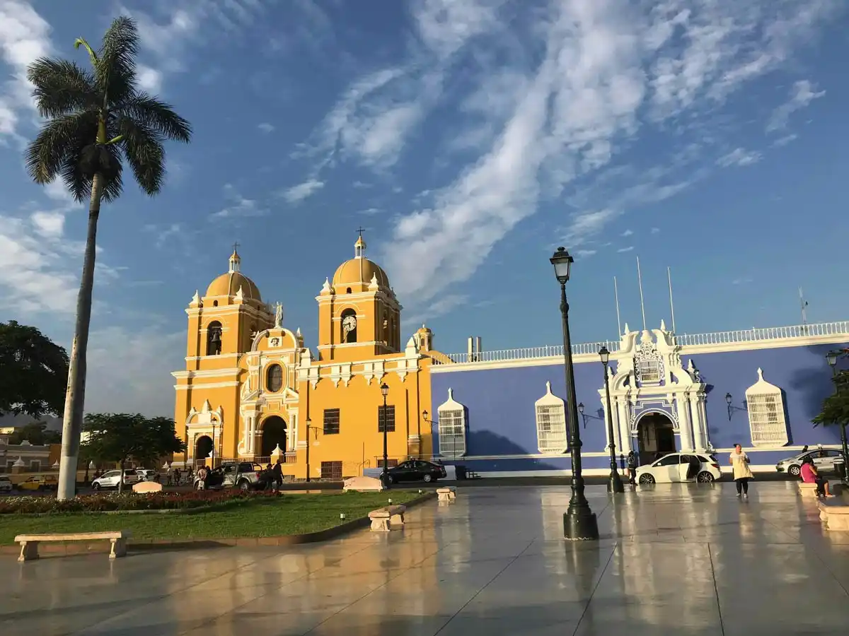 Trujillo, Peru - Yellow and white concrete building under blue sky during daytime