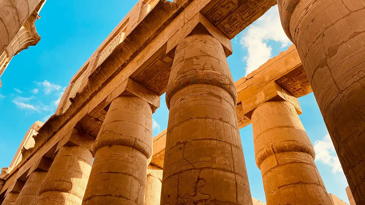 Massive columns of Karnak Temple in Luxor, an ancient historical site in Egypt